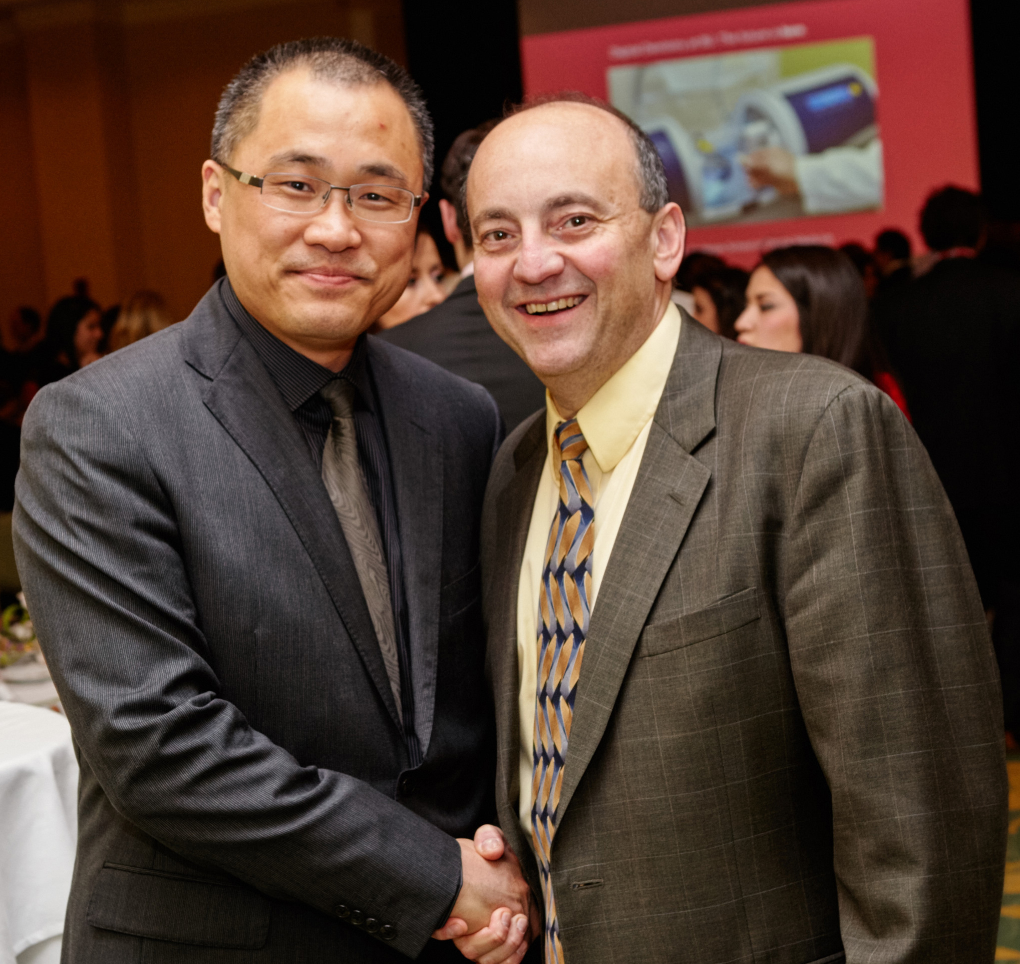 Alumni Association President Bing Liu DSC 90 DMD 03 and Alumni Association Past President Joseph Calabrese DMD 91 AEGD 92