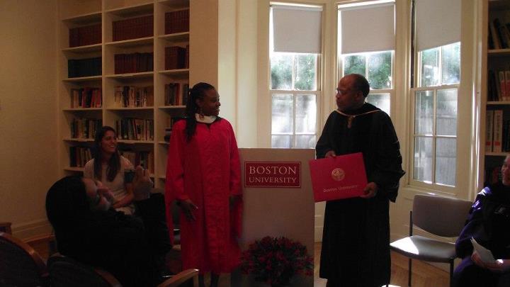 Sarata filled with pride as she recieves her diploma from Professor Blakely.