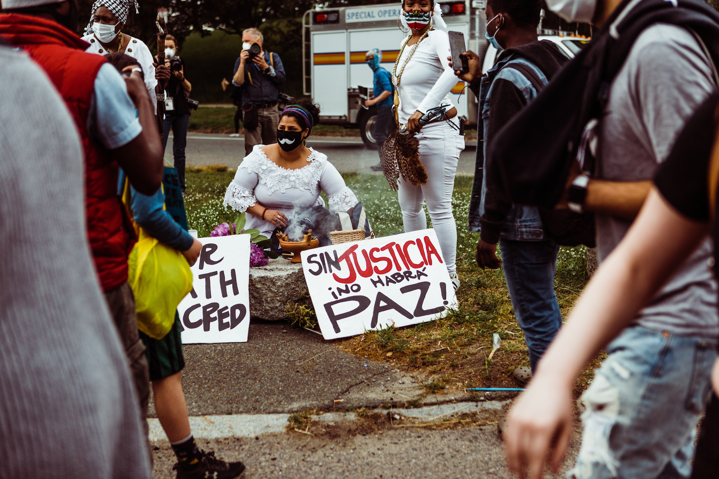 Black Lives Matter protesters holding signs