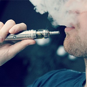 close-up photo of man vaping