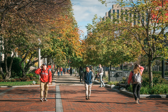 Boston University students walking on the Charles River Campus