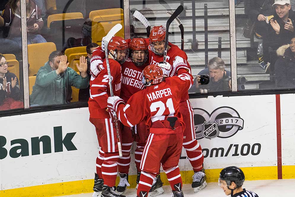 BU Terriers men's ice hockey players celebrate after scoring a goal during the 65th Annual Men's Beanpot Tournament
