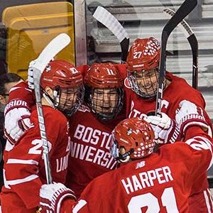 BU Terriers men's ice hockey players celebrate after scoring a goal during the 65th Annual Men's Beanpot Tournament
