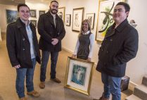 Susan Hirshberg poses with robbery thwarters Chris Savino, Mackenzie Thompson, and Jesse Doe