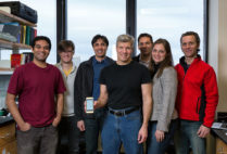 Biomedical Engineering Professor Edward Damiano in his lab with fellow researchers and their bionic pancreas