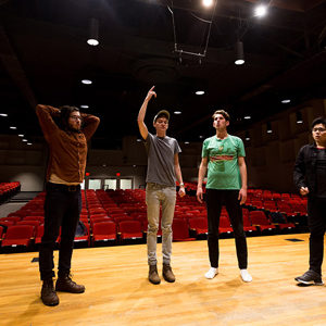 Matt Vera (center), co–music director of the Dear Abbeys, during a rehearsal for the a cappella group’s 25th anniversary concert Saturday, April 29.