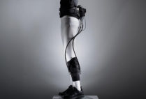 A medical exosuit designed to help stroke victims walk is displayed on a mannequin