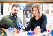 Catherine Klapperich, here with PhD candidate Justin Rosenbohm (ENG’20) in her lab. Photo by Jackie Ricciardi