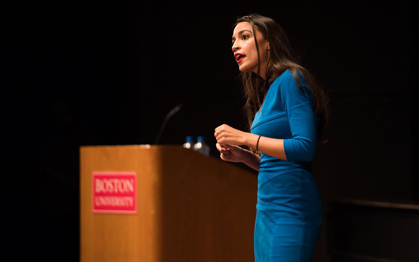 2018 midterms candidate from New York, Alexandria Ocasio-Cortez, speaks to a crowded auditorium at her alma mater Boston University.