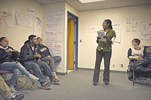 Nicole Daley and teens at a training room