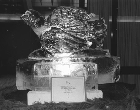 BU’s Holiday Party The award-winning ice sculpture at the December 19 University Holiday Party, entitled “Peace,” was created by a team from ENG’s Science and Engineering Library, consisting of library technicians Rebecca Trevino, Scott St. Martin, Sarah Hutton, and Melissa Theroux. The theme of the party was Traditions Olde and New. Members of the winning team said the intent of their sculpture was to portray their hope that peace would span the world in the near future. Photo by Vernon Doucette