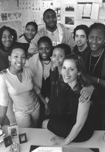 Boston Scholar Milagros Gonzalez (CAS'89) (bottom right) and students in her history class at Boston English High School. Gonzalez was the first in her family to complete an undergraduate degree program. Photo by Frank Curran