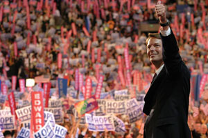 Democratic vice presidential nominee John Edwards greets the crowd before speaking at the FleetCenter July 28. Photo by Justin Smith