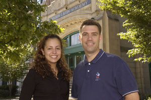 Boston Latin Academy graduates Arianne Cordon (CAS08) and Michael Maguire (CAS93) outside the school. Maguire is now an ancient Greek and Latin teacher at the public high school. Photo by Kalman Zabarsky.