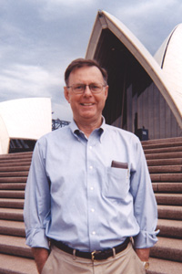 Urbain DeWinter, the associate provost for international programs, in front of the Sydney Opera House. Photo courtesy of International Programs