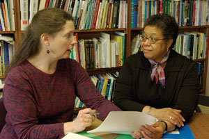 Wilma Peebles-Wilkins (right) is stepping down as longtime dean of SSW in May for a yearlong sabbatical, followed by retirement. Gail Steketee, an SSW professor, will assume the interim deanship for two years until a permanent dean is selected. Photo by Kalman Zabarsky