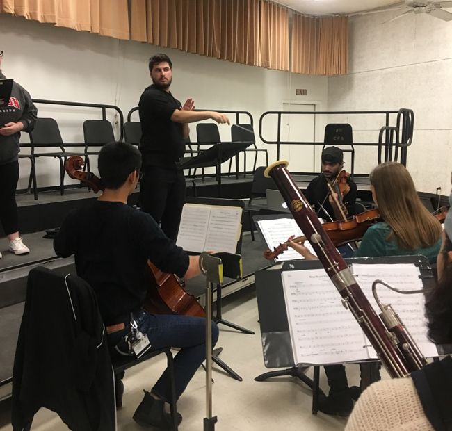 Ben Colgan conducting the pit orchestra for a CFA production of Cabaret
