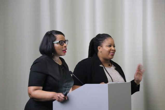 Natasha White, MUA '19, and Chardline Chanel-Faiteau, MCP '19, answer questions from the audience regarding their presentation on Greenovate's climate communication strategy.