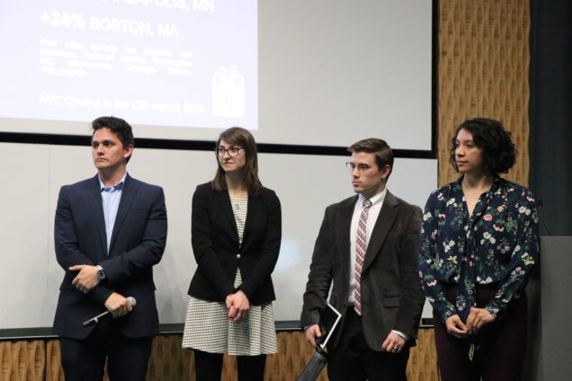 Ruben Ceron, MCP '19, Kate White, MCP '19, Diego Lomelli, MCP'18, and Jessica Martinez, MCP '18, take answers from the audience after their presentation on Greenovate Boston's movement to reduce greenhouse gas emissions.