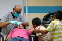 Raman Samra DMD 15 cares for a young Panamanian patient
