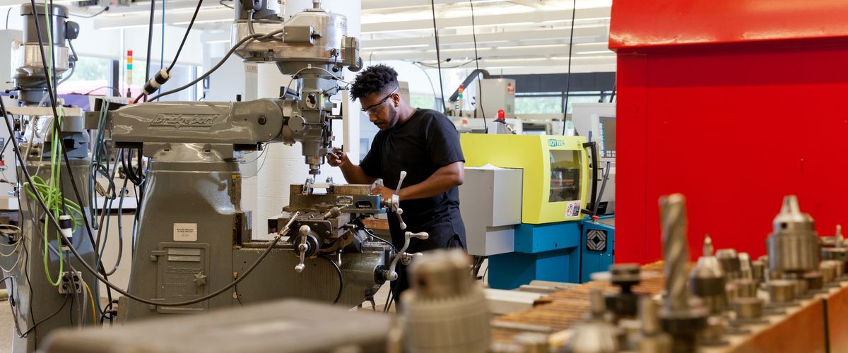 Student working at machine