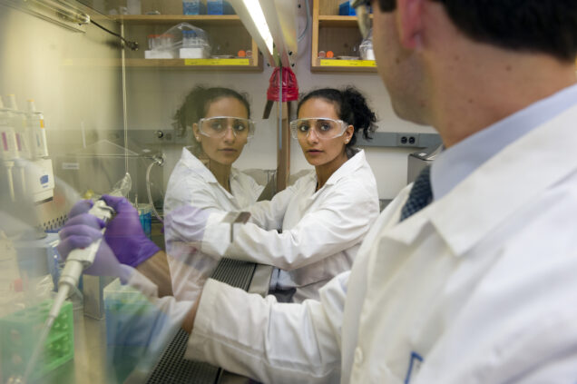 Iriny Ekladious (BME'17) and Aaron Colby (BME'14), members of the Grinstaff Group, in the lab. Photo by Cydney Scott