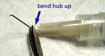 bend needle hub up