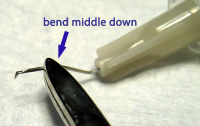 bend needle middle down