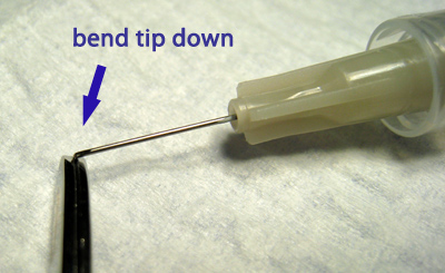 bend needle tip down