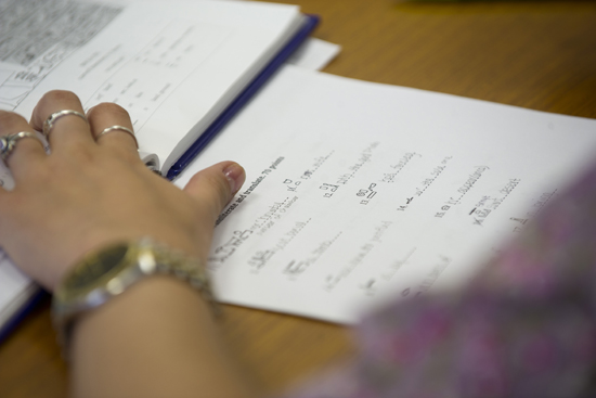 Alejandro Botta's students translate part of the Rosetta Stone. Photo by Cydney Scott for Boston University Photography.