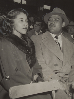Joe Louis and wife Marva at 1948 World Series, Boston Braves Field