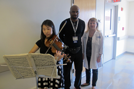 BU Arts Outreach Initiative at Boston Medical Center, violinist Ashley Ng and nurses, music therapy