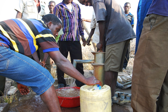 Engineers Without Borders, villagers use water filtration system Engineers Without Borders, Naluja, Zambia