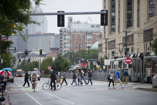 Motorists outnumber cyclists and pedestrians on Comm Ave, but their numbers are dropping, information at a public hearing Tuesday suggested. Photo by Cydney Scott