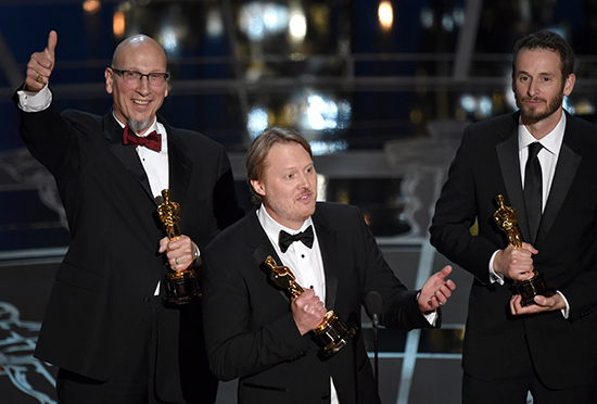 Roy Conli, Don Hall, and Chris Williams accept the Academy Award for Best Animated Feature fFlm for Big Hero 6