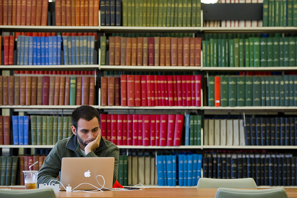 A student studies for his boards in the Boston University School of Medicine Alumni Medical Library