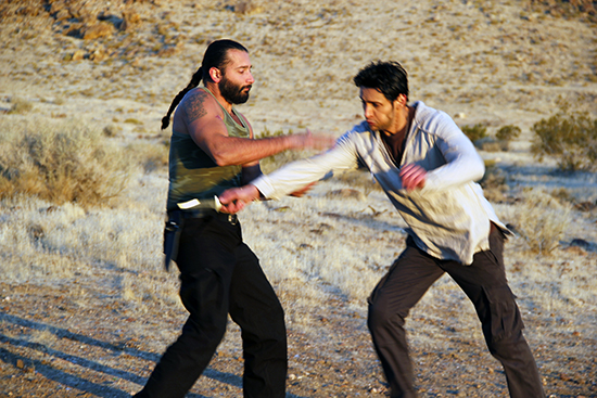 Zelko (left) stepped into a supporting role as one of the terrorists, here seen training Ben Youcef’s Ali. 