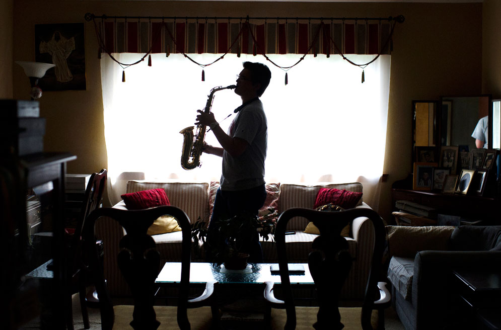 Sam DeSoto (CFA '19) practices the saxophone at home in Shirley, New York.
