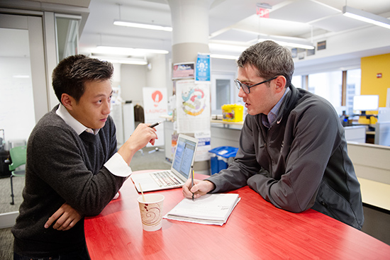 Kelvin Chan (LAW’16) (left) and Nathaniel Gray (LAW’16) are two of the eight BU LAW students working in the Entrepreneurship & Intellectual Property Clinic, a new collaboration between BU and MIT. Photos by Jackie Ricciardi