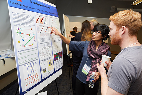 Rajita Menon, a doctoral candidate in physics, presented her work on microbial interactions in the human gut.