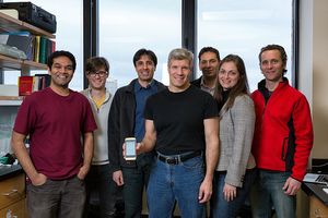 Biomedical Engineering Professor Edward Damiano in his lab with fellow researchers and their bionic pancreas