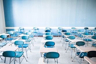 Desks in a classroom.Photo by Conor Doherty for Boston University Photography