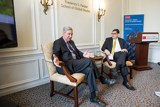 Senator Sheldon Whitehouse (D-R.I.) discusses climate change to Pardee School faculty at Pardee School May 4, 2016. At right is Pardee Dean Dr. Adil Najam