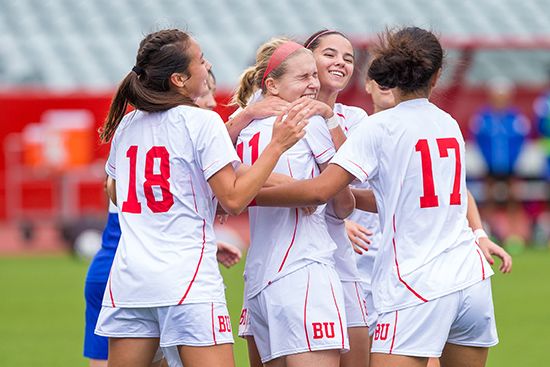 Patriot League champion BU women’s soccer team celebrate a goal