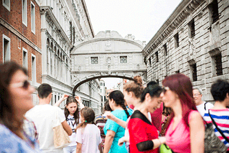 Students crossing street in Venice, Italy