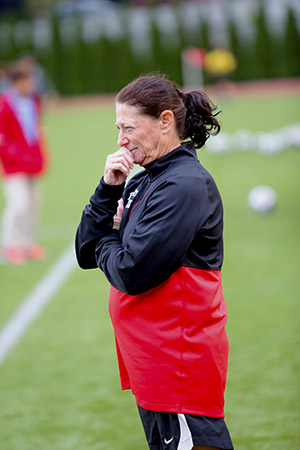 Coach Nancy Feldman coaching a soccer game