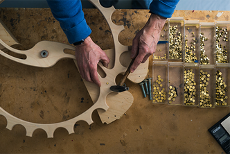 David C. Roy creating and assembling kinetic sculptures in his workshop