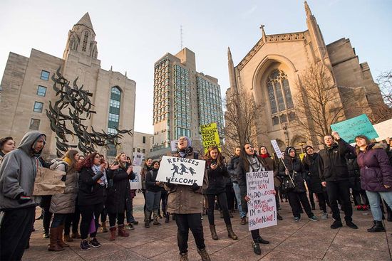 Students at Boston University participate in a rally protesting Donald Trump's Executive Order Immigration and Refugee Ban