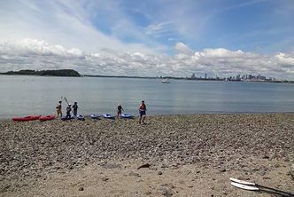 kayakers on shore