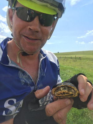 Mark Williams holding turtle